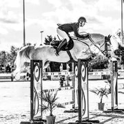 professional rider jumping with ophena's magnetic safety stirrups Ophena S Pro