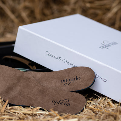 Ophena Magnetic Insoles on straw, in a stable environment
