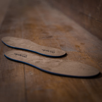 Ophena Magnetic Insoles on wood